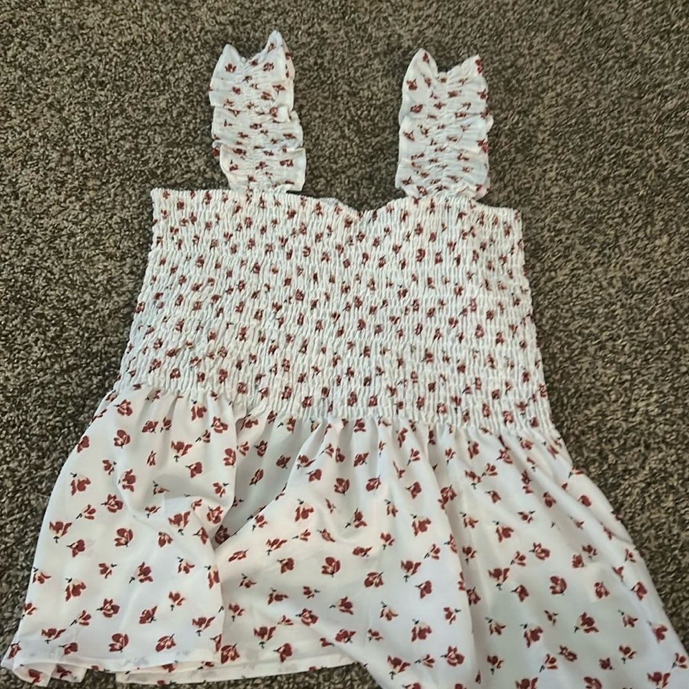 nice top, size L but fits a little big on me and i’m a small, was a gift